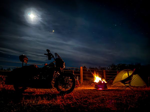 Starry night camping by motorcycle thumbnail