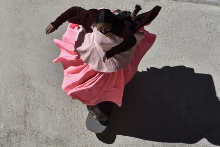 A member of the Indigenous Bolivian women&#39;s skateboard collective Imilla Skate in La Paz on June 16, 2022.