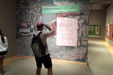 Visitors in the gallery are confronted not just with the violence of colonization, but with the agency of Native and African resistance in the Caribbean, as well. Graphic design by Barbara Suhr for NMAI. Photo by Lawrence Waldron.
