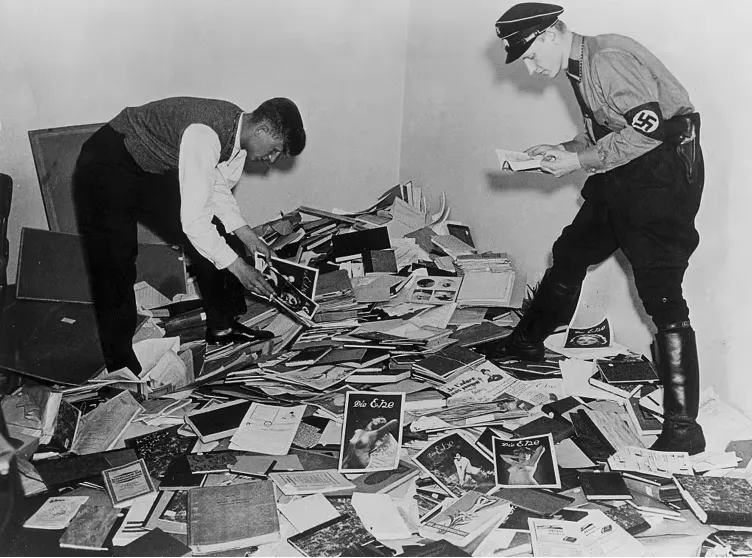 Nazis select books for burning at the Magnus Hirschfeld Institute for Sexual Sciences in Berlin.