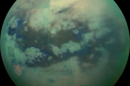 The darker areas across Titan&#39;s equatorial regions represent its dunes, as taken by the Cassini rover.