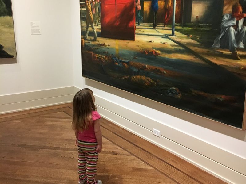 Two year old child admiring a painting at the Virginia Museum of Fine