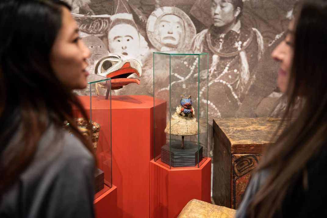 Visitors learning about the history and culture of the Nisga'a people at the Nisga'a Museum in Laxgalts'ap