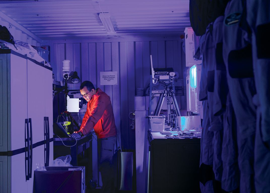 A man works on weather experiments.