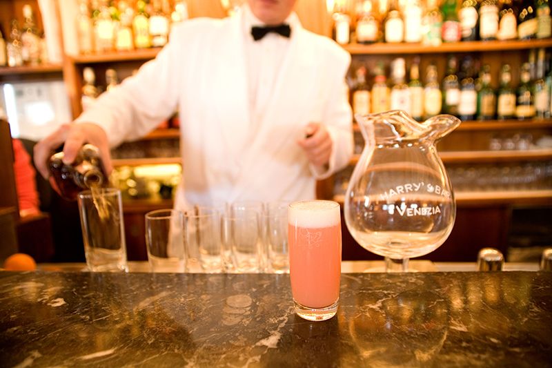 A full measure of bars. Cocktail drinks served in glasses with