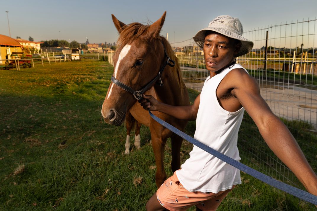 Masemola’s dedication to the school and the horses, rising at 5 each morning to feed them and turn them out, has earned him the position of head trainer.