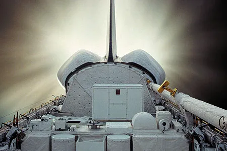 The space shuttle’s cargo bay is more than just a shipping container. It’s also a workspace for spacewalkers.