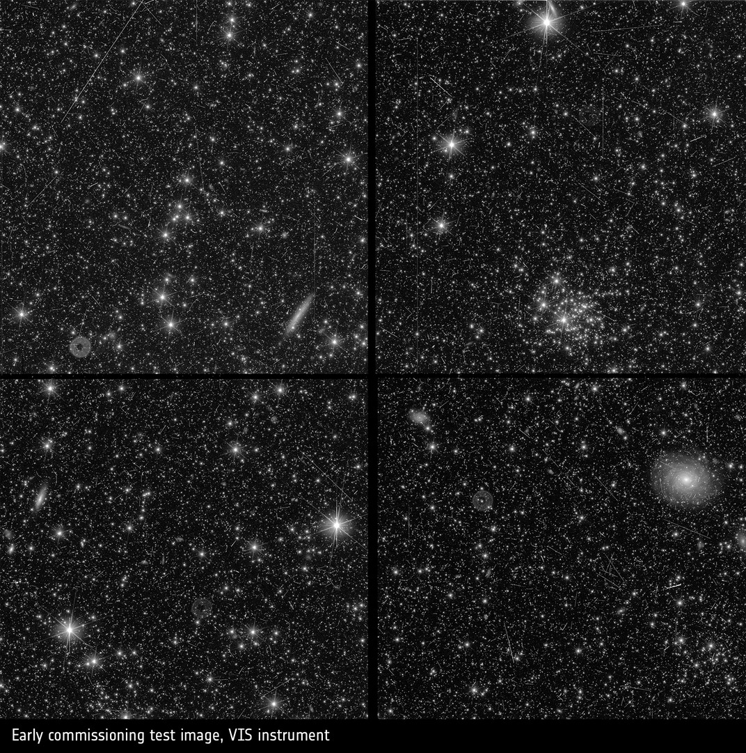 An image of outer space showing distant stars and galaxies in a white color