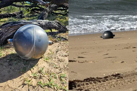 Strange, metallic-looking spheres recently washed ashore in Queensland, Australia.