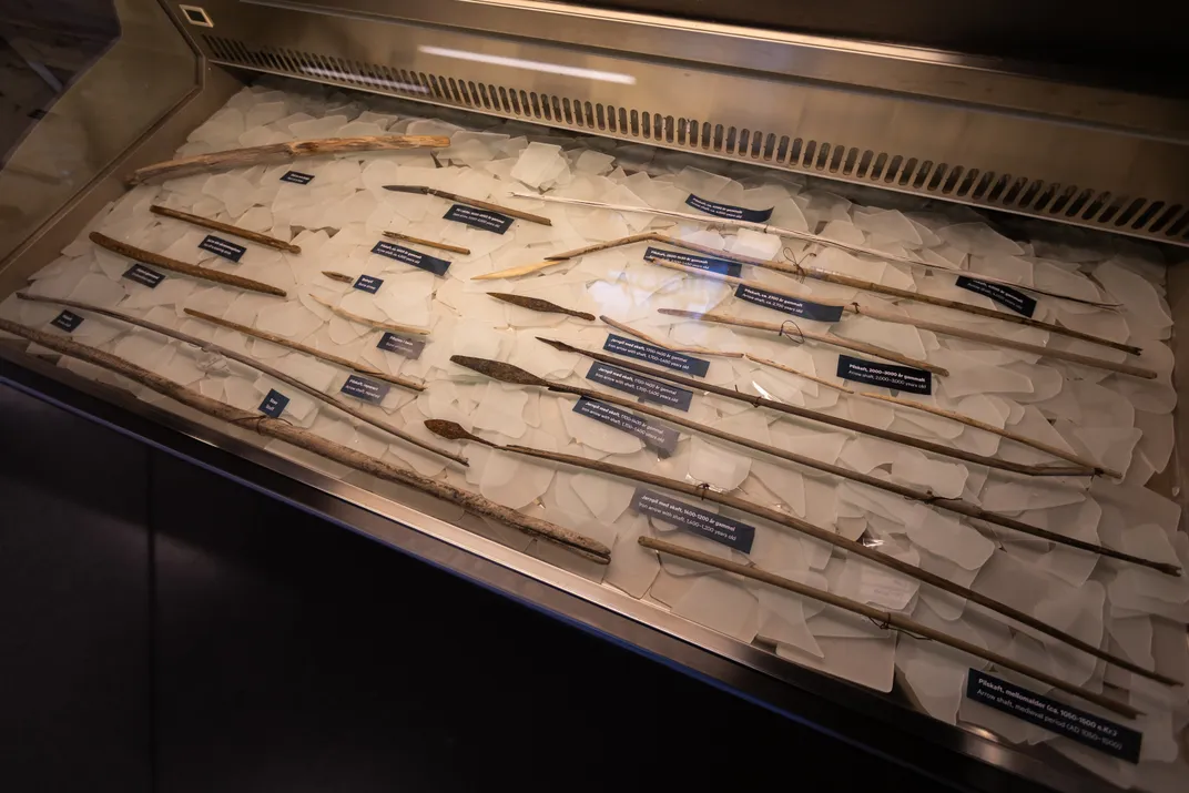A refrigerated display case with artifacts