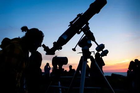 Looking through a telescope or binoculars can help you see Venus in its crescent phase on Valentine&#39;s Day&mdash;but the planet is visible to the naked eye.
