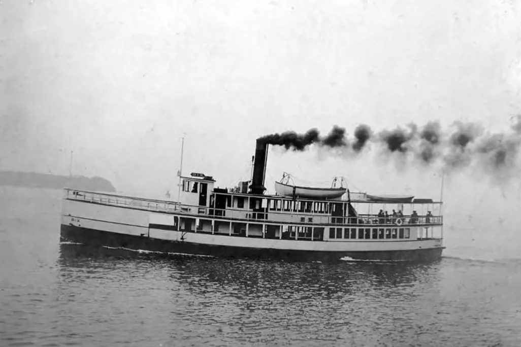 Black and white image of small ferry