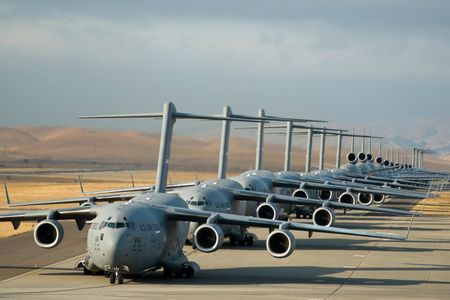 This "elephant walk" of 22 aircraft at the Travis Air Force Base in California includes seven C-17 Globemaster IIIs, 11 KC-10 Extenders, and four C-5B Galaxies and redubbed a "freedom launch" as they took-off on September 11, 2013.

Image: U.S. Air Force photo by Ken Wright