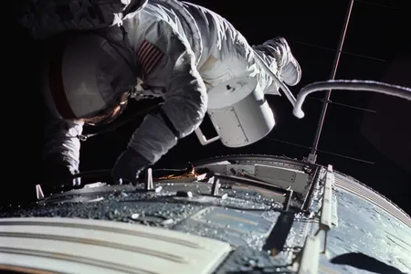 Ron Evans floats outside the Apollo 17 spacecraft on his way back from the Moon in 1972.