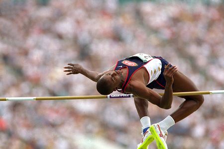 Charles Austin competes in the high jump at the 1996 Summer Olympics in Atlanta.