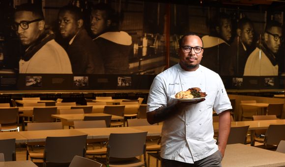 Local Washington, D.C. based chef Jerome Grant was one of 12 presenters in the DCPS Career Ready Internship program for students interested in hospitality careers. Grant shared his philosophy around creating unforgettable dining experiences as a former chef in Smithsonian spaces including the Mitsitam Café at the National Museum of the American Indian and Sweet Home Café at the National Museum of African American History and Culture. (Marvin Joseph, The Washington Post via Getty Images)
