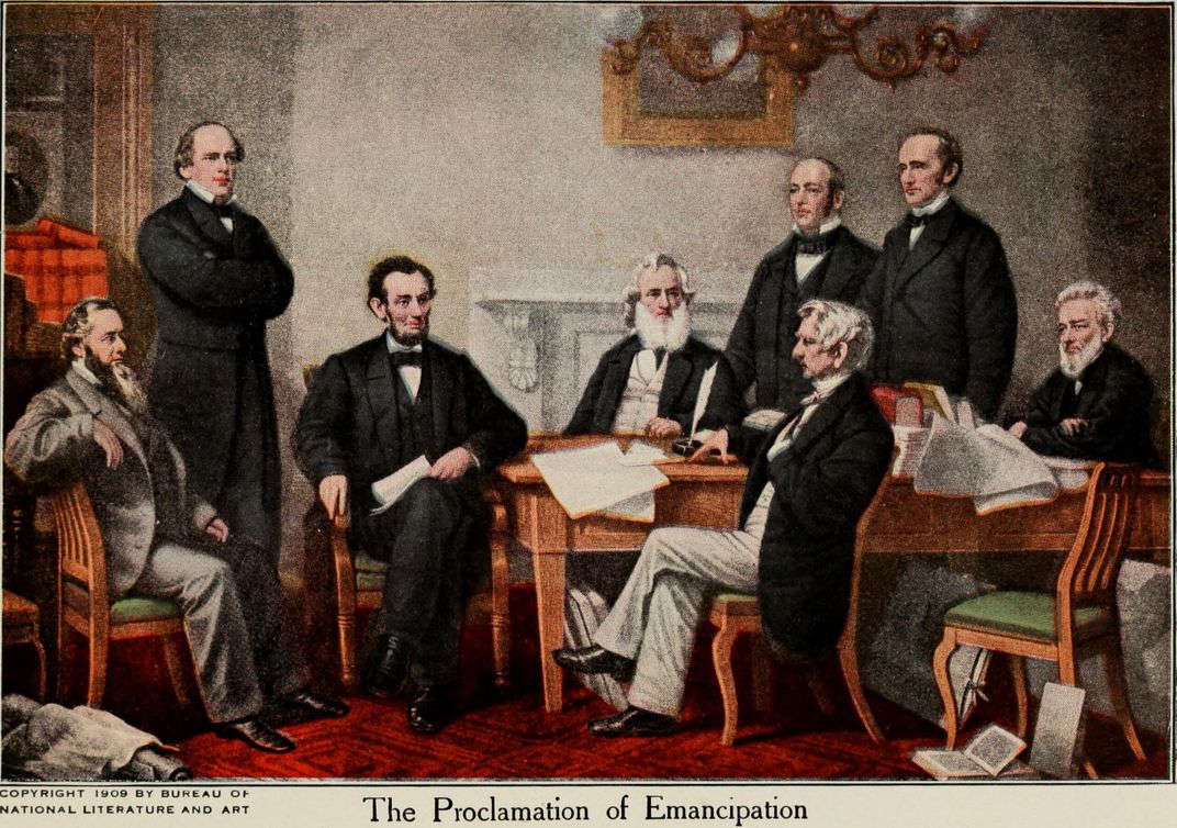 Stanton appears at far left in this illustration of the first reading of the Emancipation Proclamation.
