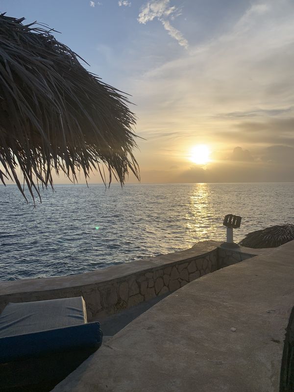 Watching the sunset from a restaurant in Negril, Jamaica West Indies. thumbnail