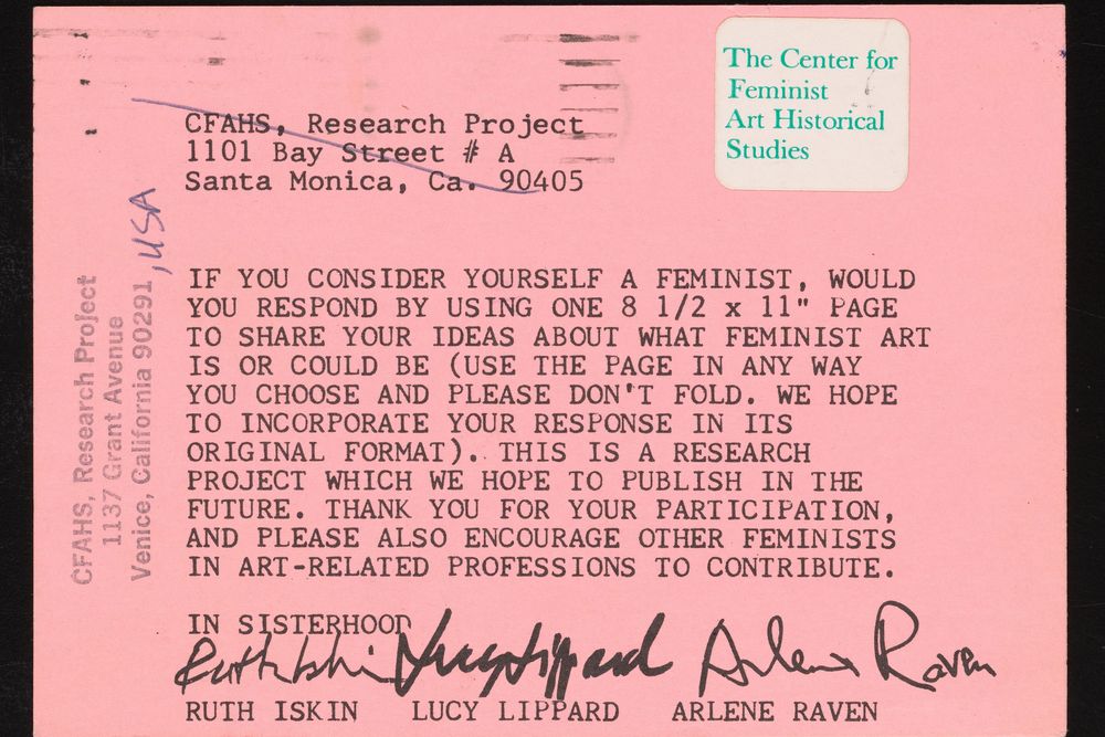 The 'What is Feminist Art' exhibition, with images on the wall and a quote 'History without art is not possible and history without feminism is not history' Jodie Herrara