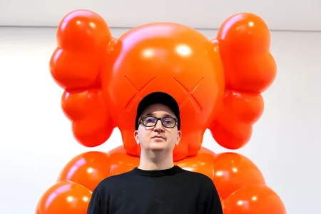 On May 20, the artist KAWS, also known as Brian Donnelly (above at Rockefeller Center in August 2021), received from the Smithsonian's Hirshhorn Museum and Sculpture Garden an award for "his contributions to art and popular culture."
