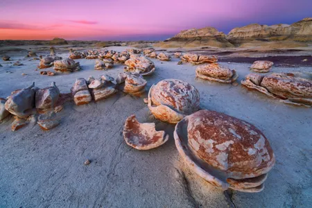 The Bisti Badlands in northern New Mexico is known for its Easter egg-like rock formations. 