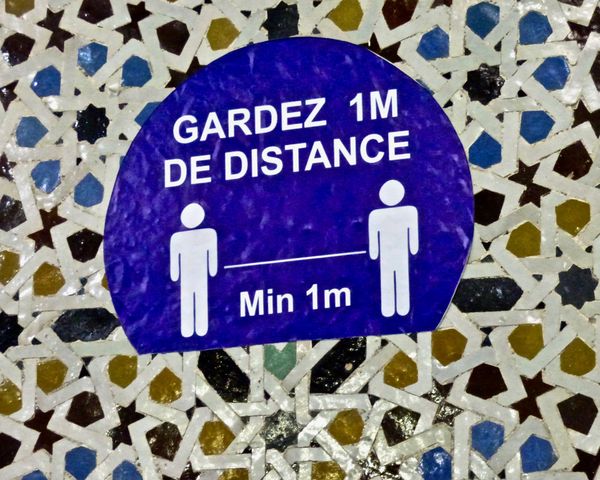 Ornate Algerian tilework adorns Covid-19 safety signage at Hotel Les Zianides thumbnail