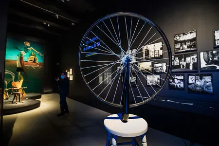 Installation view of "Objects of Desire," which features such Surrealist creations as a stool topped with a bicycle wheel