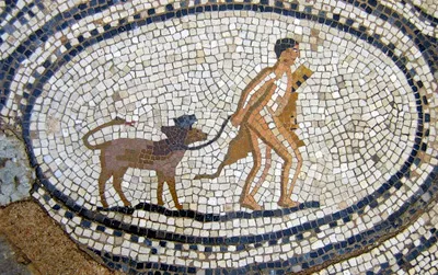 A mosaic of Hercules with pet Cerberus.