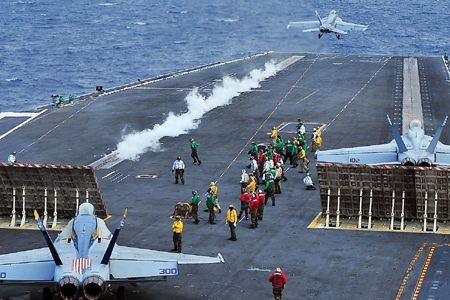 An F/A-18F Super Hornet launches from the aircraft carrier USS George Washington in 2009.