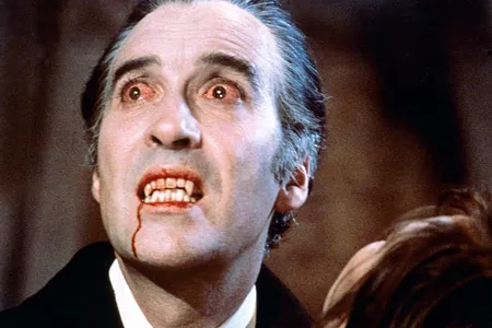Christopher Lee as the titular vampire in Terence Fisher’s 1958 Dracula, showing off bloody canines that would prove weirdly influential.