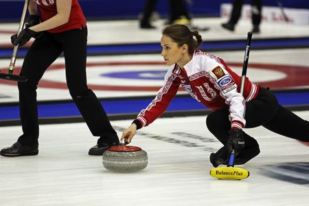 Russia's Anna Sidorova plays during the 2014 World Women's Curling Championship.
 