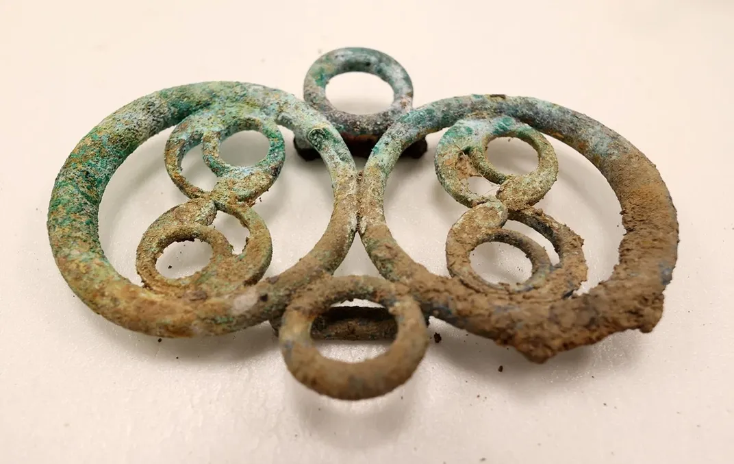 Decorated piece of metal