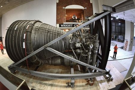 Moving the Rocketdyne F-1 engine into the new Destination Moon gallery took an entire day. Suspending it from the ceiling took another 10 hours. The hardest part? A sharp left-hand turn out of the old gallery, and another into the new exhibit space.