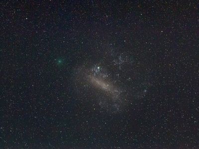 The green object is the comet 252P/LINEAR as it passed by the Larger Megellanic Cloud.