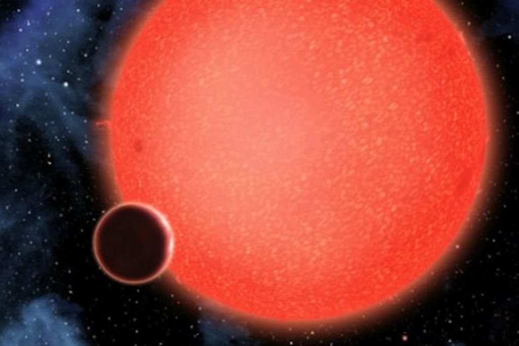 An artist's rendering of GJ1214b, orbiting a red dwarf star
