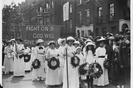 Suffragettes form a part of Emily Davison's funeral procession through London. She was a fellow campaigner who was trampled to death when, as a protest gesture, she tried to catch the reins of King George V's horse as it ran in the 1913 Epsom Derby.