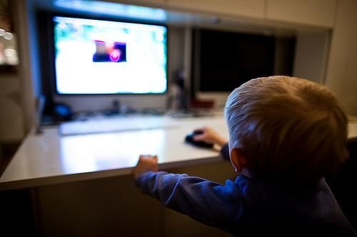 kid on computer