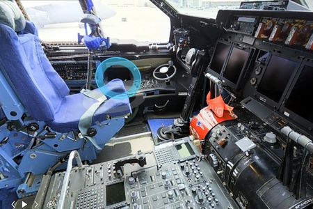 Want to see the view from the left seat of a C-5 transport? Just keep staring at that blue circle.