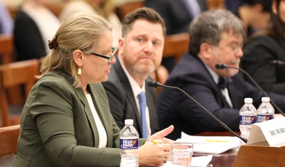 Dr. Suzan Murray, Program Director for the Smithsonian’s Global Health Program, reading her testimony at the House Science Subcommittee’s Coronaviruses: understanding the Spread of Infectious Diseases and Mobilizing Innovative Solutions hearing that occurred in March 2020.