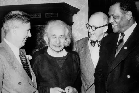 Einstein enjoyed a 20-year friendship with African-American civil rights leader and actor Paul Robeson (far right). Also shown are former vice president Henry Wallace (left) and Lewis L. Wallace of Princeton University (second from right).