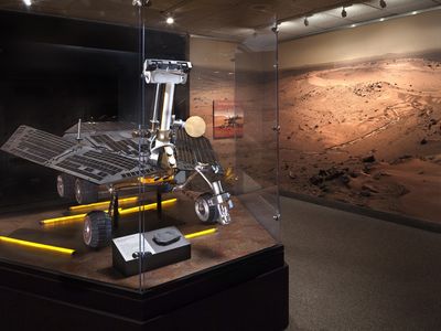 A full-scale Mars Exploration Rover, surrounded by one of its panoramic photos, is the centerpiece of a new exhibit.