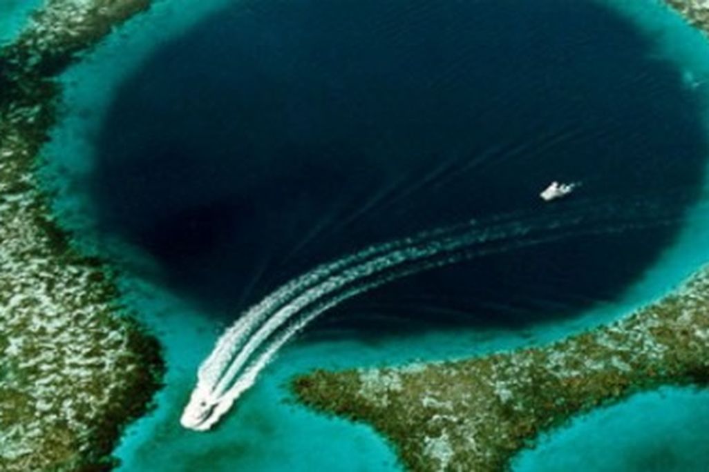 The Great Blue Hole of Belize was named by Jacques Cousteau as one of the world's top diving sites.