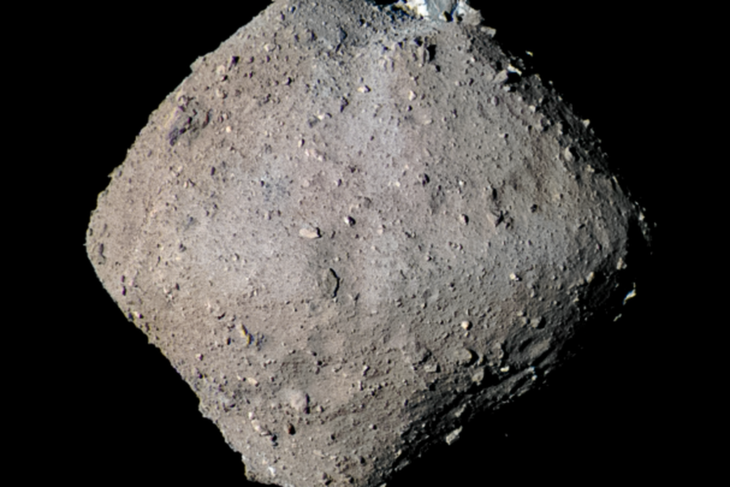 a diamond-shaped asteroid against a black background