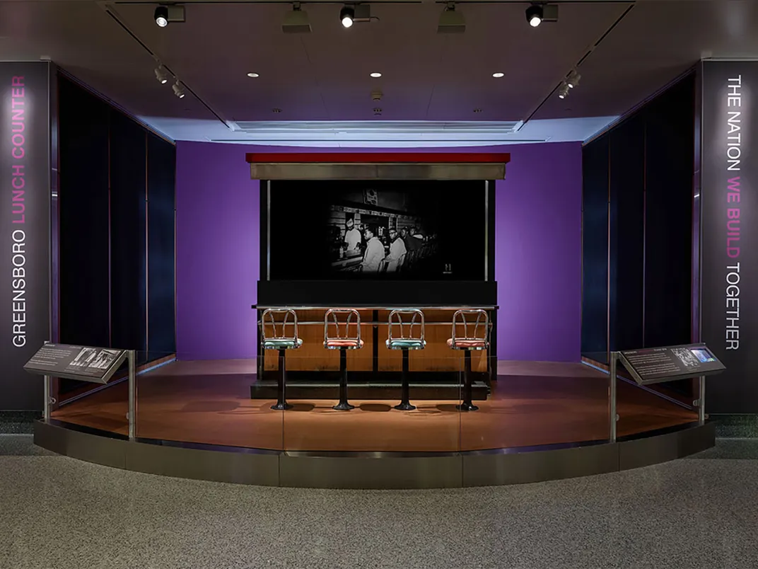 a lunch counter on display at the American History Museum