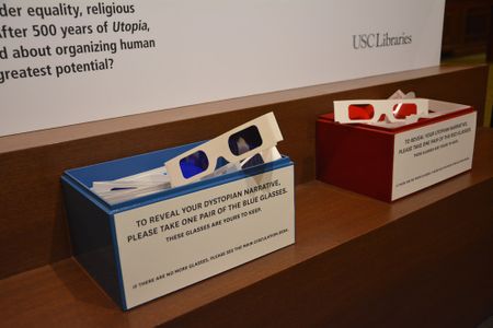 Decoder glasses help visitors view both utopian and dystopian angles to the exhibition