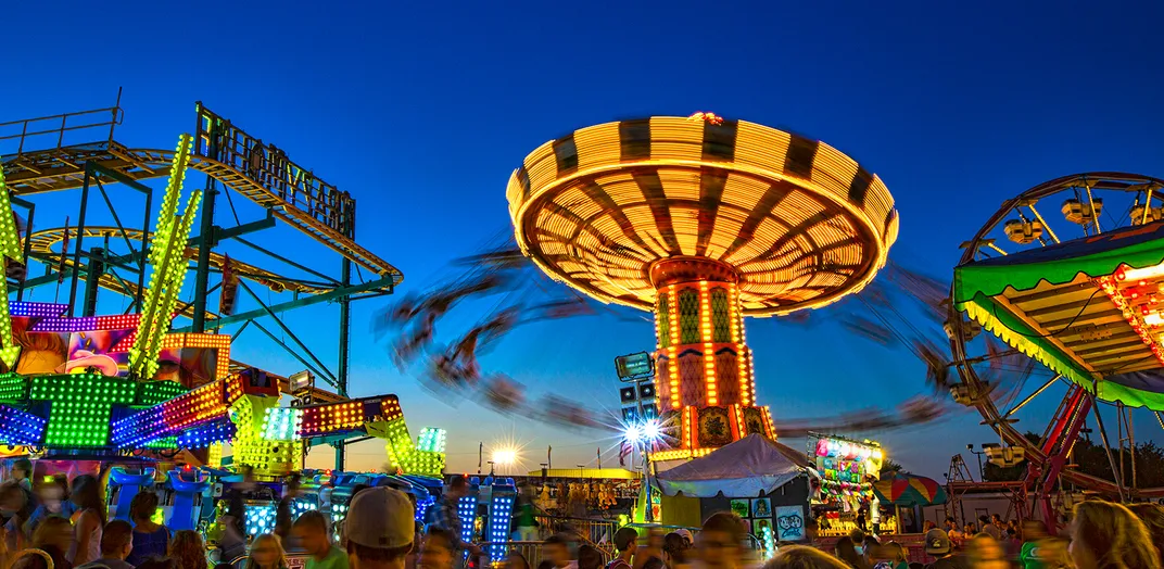 This is a panorama of the Paso Robles Mid-State Fair taken at dusk