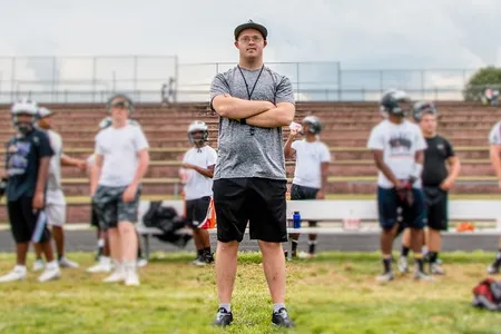 Alex Hudson wearing Specs4Us glasses