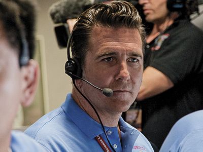 Adam Steltzner (center) and team await the good news from their Mars lander last August.