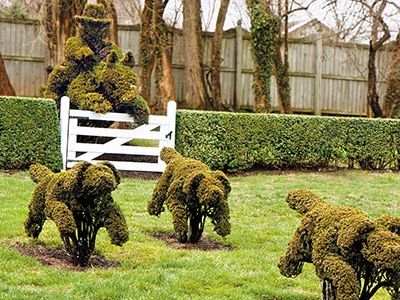 Whimsy runs riot at Harvey Ladew's Maryland estate, from a library with a shelf that swings open to reveal a secret entrance to the gardens to the topiary hedges, featuring a fat man walking a tiny dog, and a rider and hounds in hot pursuit of a fox.