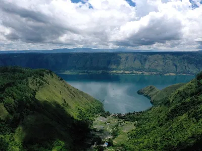 Indonesia&#39;s Lake Toba, formed by a volcanic eruption around 74,000 years ago. In the new study, researchers uncovered fragments of glass from the eruption at an archaeological site in northwest Ethiopia, pointing to the volcano&#39;s global impacts.